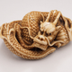 Illustration for article titled Spirit Foxes and Raunchy Demons in Japanese Netsuke Art